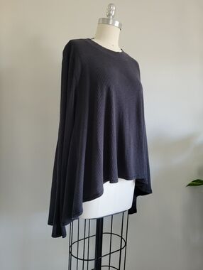 Charcoal colour knit long sleece swing top, flared  at bottom, hi low hem